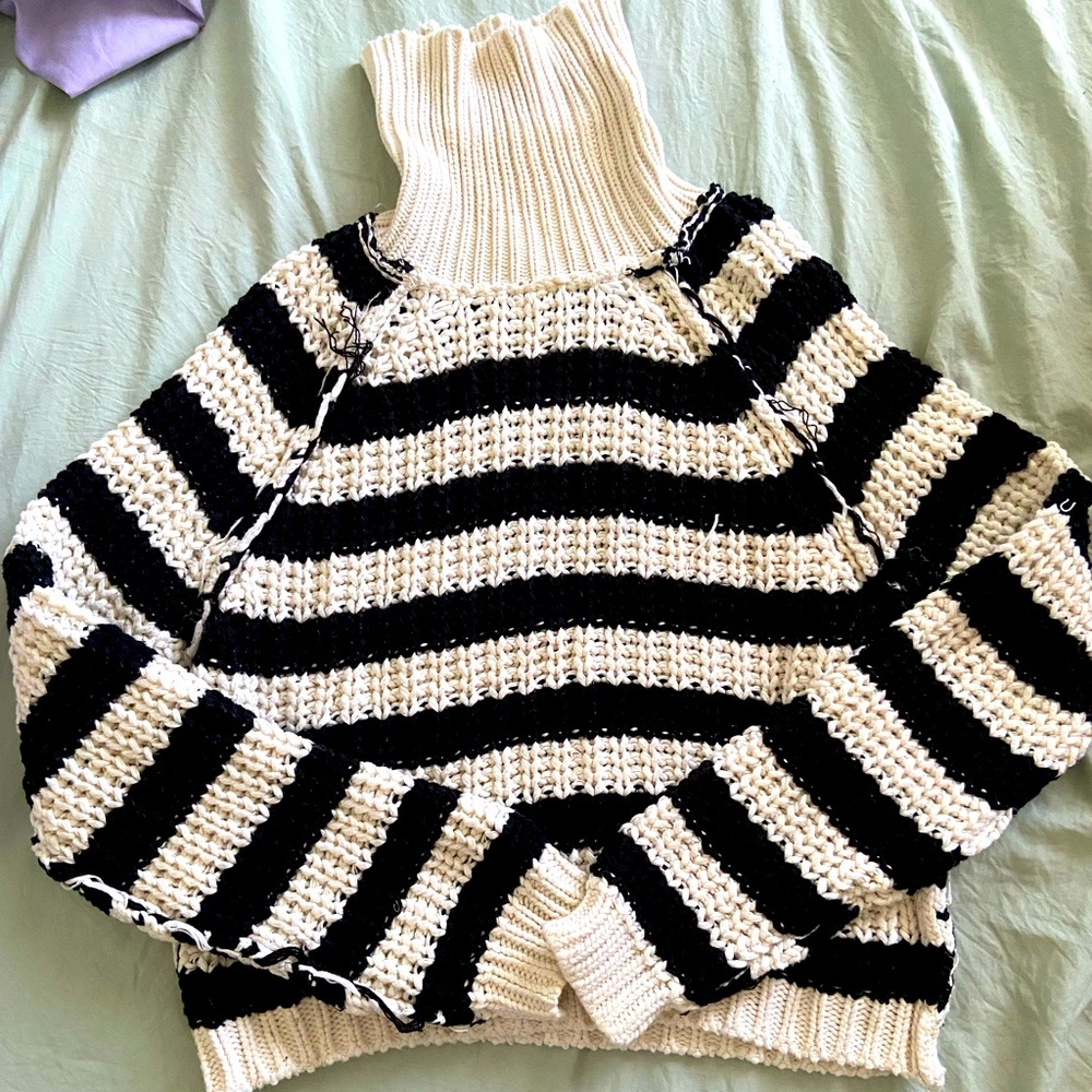 Selling this long sleeve sweater